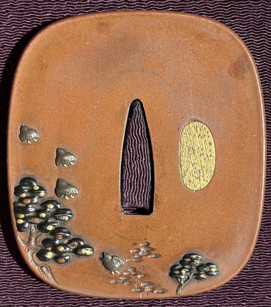 The back: a pine and three plovers at the left, small pines along the lower edge, the gold-filled hitsu-ana at the right.